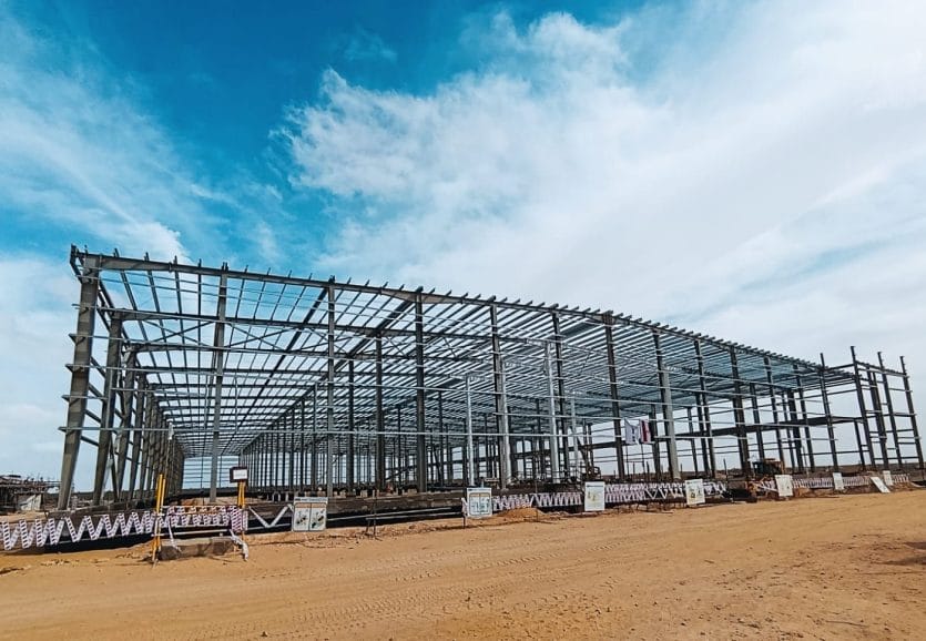 medical-warehouse-steel-structure-exterior Complete structural steel frame of an industrial medical warehouse in Egypt, fabricated and erected by SMI